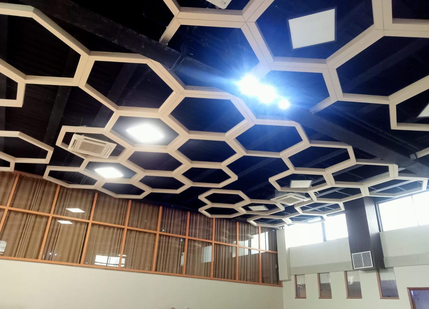 Hexagonal timber ceiling by PTP